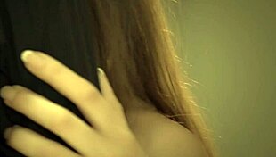 Candice Luca dances romantically with her partner.