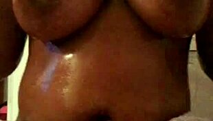 Rubbing Oil on My Big Tits Pt 2