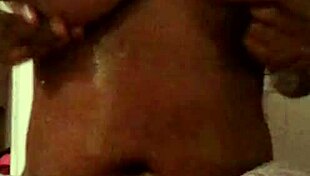 Rubbing Oil on My Big Tits Pt 2