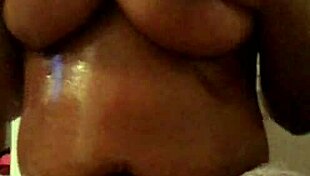 Rubbing Oil on My Big Tits Pt 2