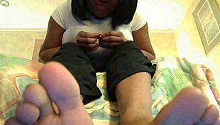 Ebony girl jerks off to toe game