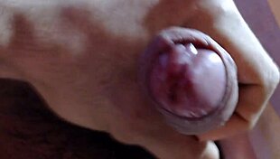 in the quiet room, a gay guy masturbates to cum