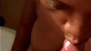in the reality of friends, a horny black busty mature girlfriend kneels to suck her boyfriend's cock close up