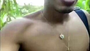 in the public park, two gay amateurs engage in live bareback sex outdoors