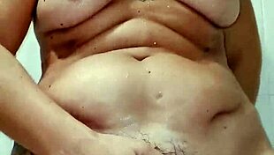 Lovers masturbate in bathroom