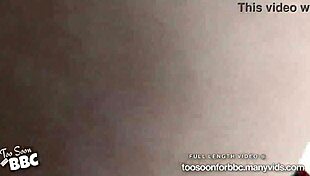 After Washing Dishes, She Relaxes on the Couch