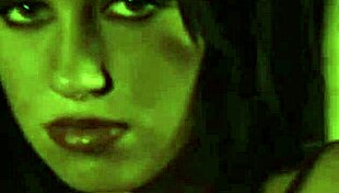 She dances sensually, teasing with her nude body