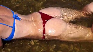 In the water of the Volga River, enjoying a beach day in a bikini.