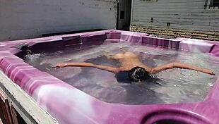 Shaved pussy in hot tub