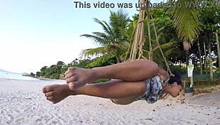 Shibari bondage on public beach with lordshibarifloripa, featuring ripped clothes, natural big tits, and voyeur fetish