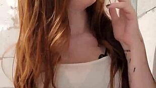 This Redhead Smoker Is Indulging In Her Fetish!