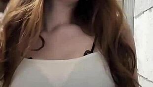 This Redhead Smoker Is Indulging In Her Fetish!