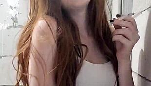 This Redhead Smoker Is Indulging In Her Fetish!