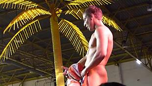 Erotic stripper dances nude outdoors, giving handjob and blowjob after ripping clothes.