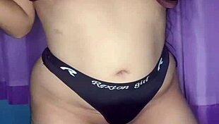 Latina amateur masturbates seductively during video call with explicit close-ups.