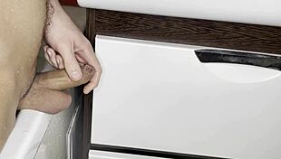 supermdick33 jerks off his shaved cock in the bathroom close up