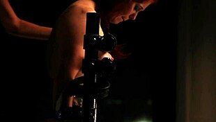 this redhead bdsm lesbian sub is getting spanked by her femdom mistress in bondage