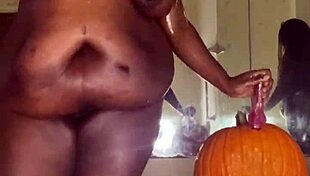 happy halloween, watch ebony babe ride pumpkin dildo