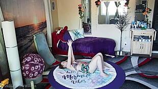 Redhead mommy stretches in yoga with shaved cameltoe exposed.