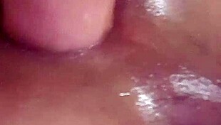 Tight shemale dominates huge dildo