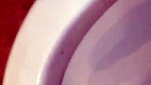 Woman pisses in underwear and pours blue soap on cock