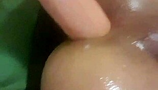 Tight shemale dominates huge dildo