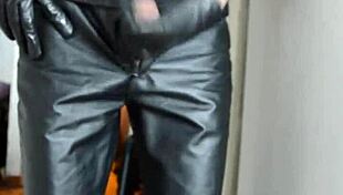 Solo guy stroking hard in tight leather pants