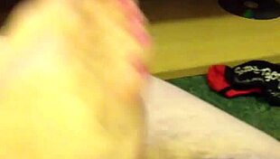 Hot wife gives intense footjob leading to massive cumshot on pink toenails!