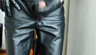 Masturbating in leather pants: Solo boy's steamy video