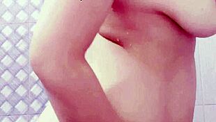 Big tits and boobs dripping water in cumshot scene.