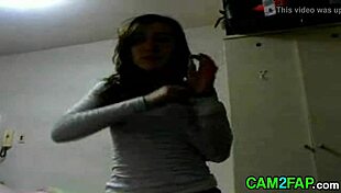 Webcam girl shows off her amateur striptease on college cam