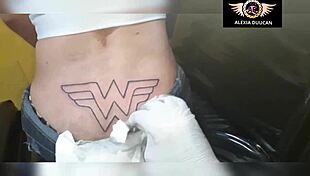 celebrity tattoo artist like anitta inked alexia duucan's ass, capturing the trans model's best moments getting tattooed on her butt