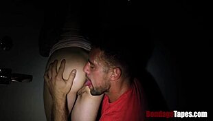 Bound woman fucked by stranger in dark.