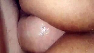 The latina putinha slowly sits her big ass on my monster cock, feeling the tight anal penetration in her asshole.