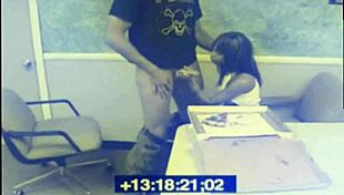 Watch this black babe give a blowjob on CCTV.