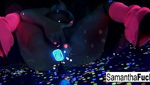 In this solo video we see Samantha Saint's big tits and ass glow in the dark