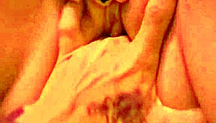 Blonde Babe Indulges In Private Moments On The Bed