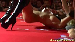 watch that busty milf rip clothes on stage?