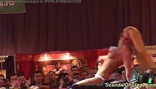 watch that busty milf rip clothes on stage?