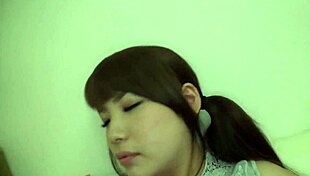 Check out this busty Japanese wife with amazing boobs