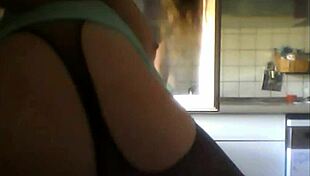 The milf shows off her big tits.