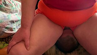 Beautiful chubby woman smells and licks submissive man’s pussy in femdom video