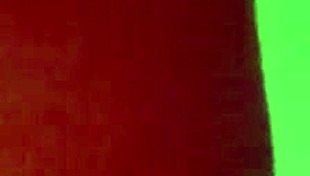 she grabs the dildo and toys with her cock