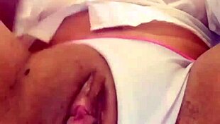 Young Woman Engages in Wet Shirt Pussy Masturbation on Webcam