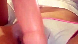 Young Woman Engages in Wet Shirt Pussy Masturbation on Webcam