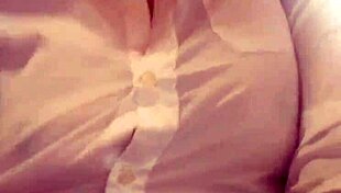 Young Woman Engages in Wet Shirt Pussy Masturbation on Webcam