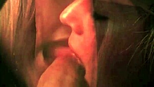 Vintage Scene with One Mouth Taking on Two Hard Cocks