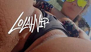 Latina amateur exposes natural tits and pussy on brazilian beach