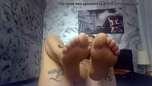 i'm watchin this skinny blonde sexy girl with small tits on webcam doin feet fetish stuff