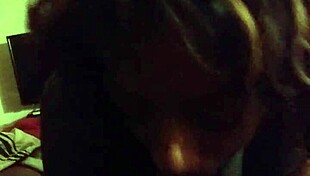 she loves sucking this big cock, licking every inch while moaning softly